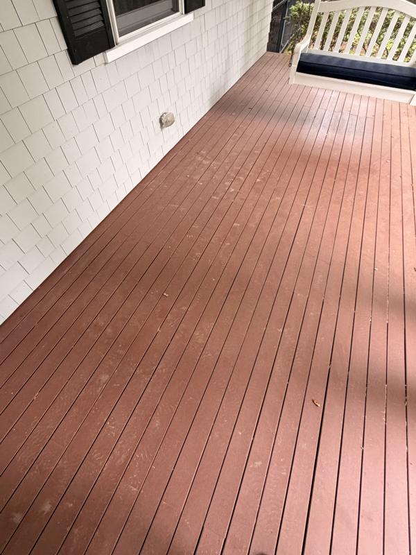 Porch deck with stains and marks
