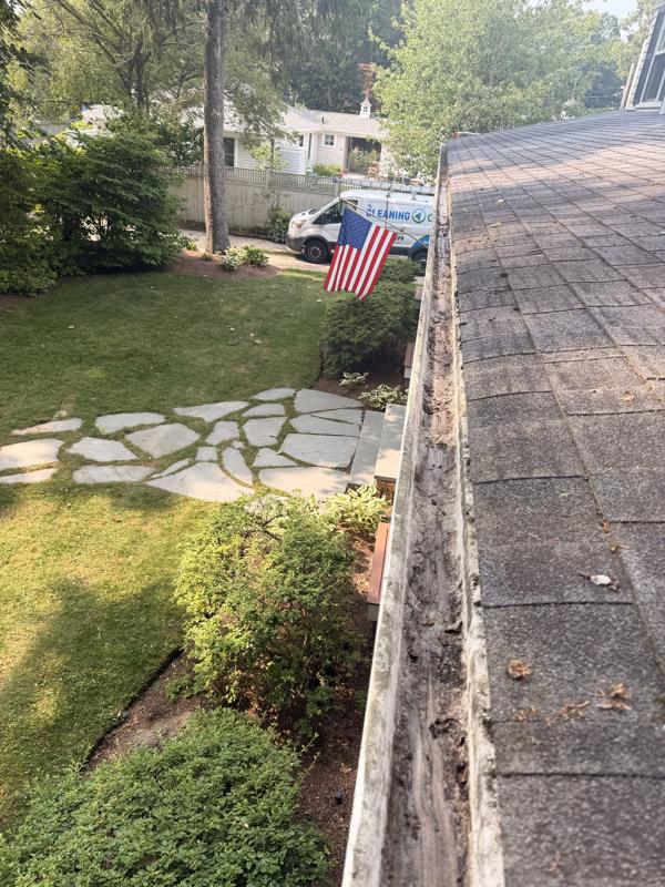 Same gutter cleared and flowing